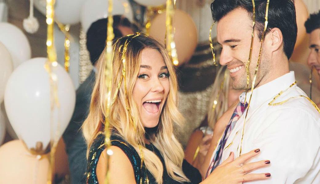 Lauren Conrad Shows Off Her Growing Baby Bump at Fashion 